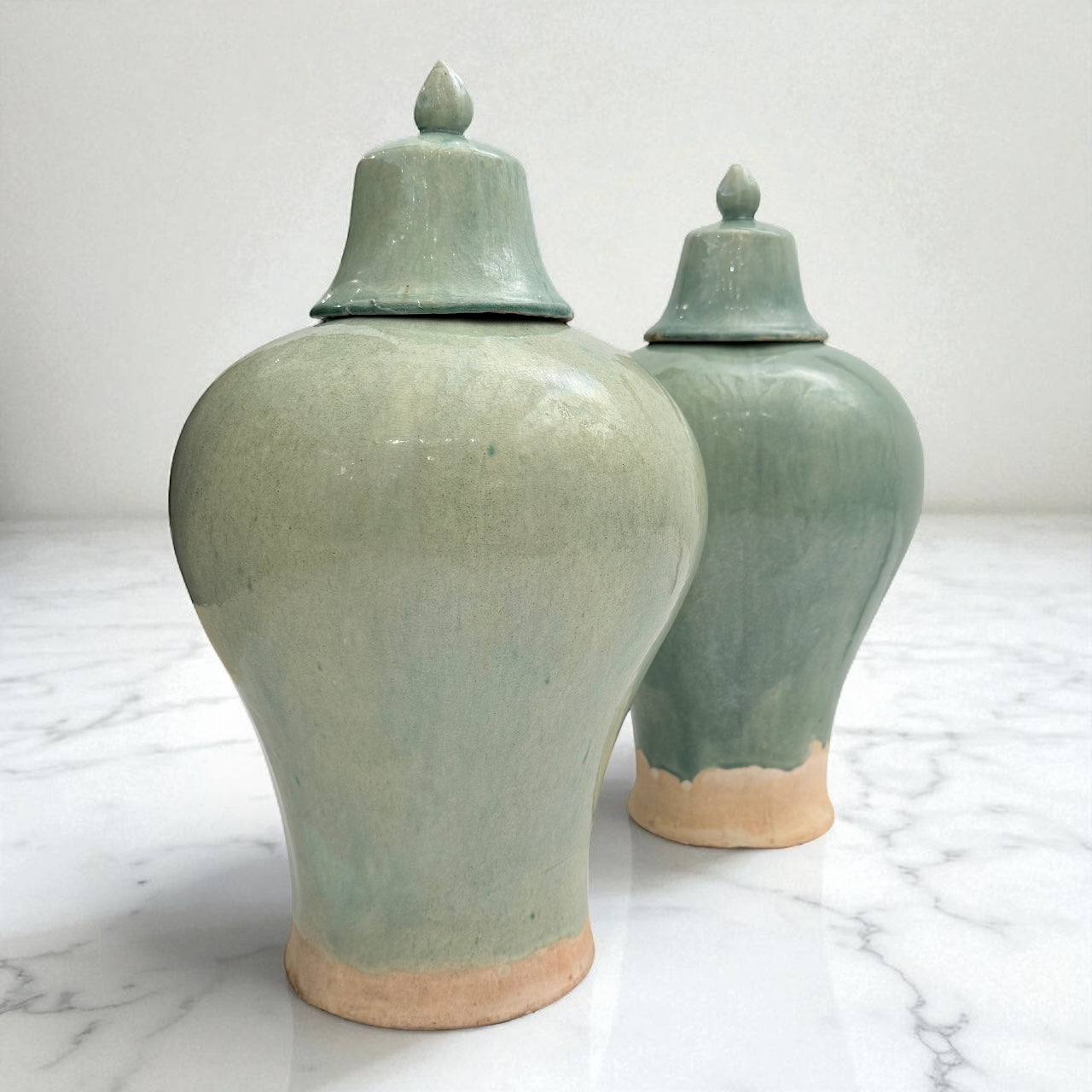 Pair of Celadon Stoneware Temple Jars