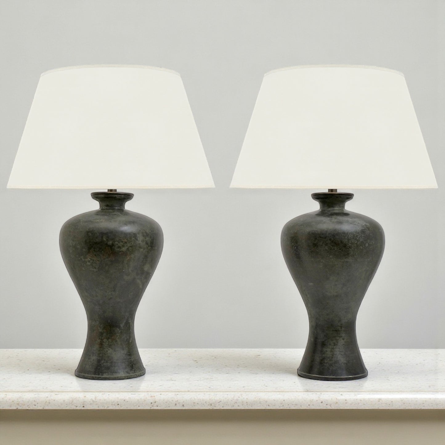 Pair of Urn Shaped Bronze Lamps